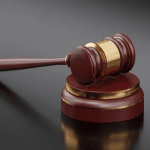 Accused acquitted in case of obstructing police department from discharging its duties