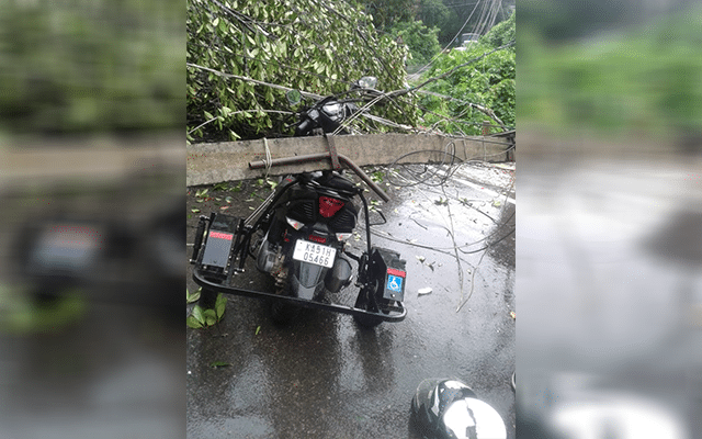 A rider was injured after an electric pole fell on a moving scooter.