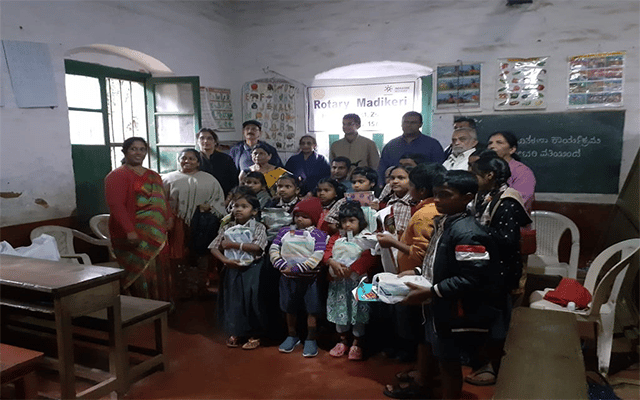 Rotary Madikeri distributes books to students