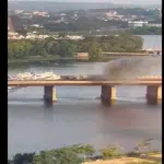 Fire breaks out in train passing over bridge