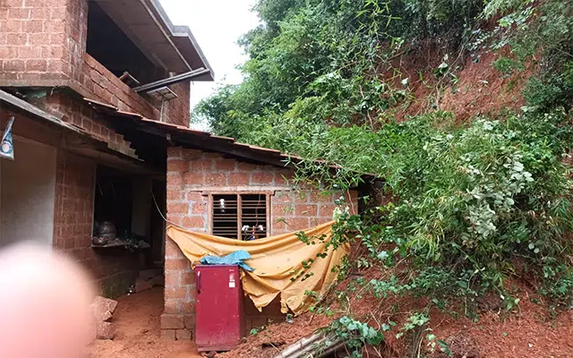 Kasargod: A hillock collapsed on a house due to heavy rains and partially damaged