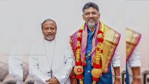 Archbishop of Bangalore M.R. DK Congratulates Peter Machado On Christmas