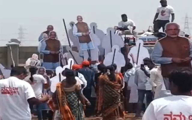 PM's arrival: People flock to cut-out banners