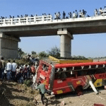 At least 15 killed as bus falls into river from bridge top